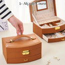 Porta-Jóias Maleta Compacto e Leve com alça de transporte, ideal para organizar e proteger suas joias em viagens. Design elegante e material de couro PU. Cabe facilmente em bolsas de mão