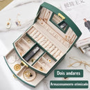 Porta-Jóias Maleta Compacto e Leve com alça de transporte, ideal para organizar e proteger suas joias em viagens. Design elegante e material de couro PU. Cabe facilmente em bolsas de mão